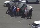 Crowd Flips SUV That Had Been in Car Accident