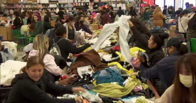 Bargain Hunters Find Discounted Designer Clothes at Bin Sale