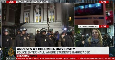 Lines of police in riot gear enter Columbia University campus