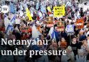 Thousands protest in Israel as cracks show in war cabinet | DW News