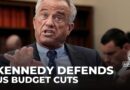 Kennedy defends White House budget cuts in tense congressional hearing