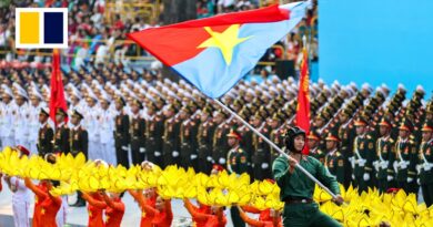 Vietnam marks 50th anniversary of reunification, Chinese troops march in military parade