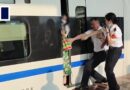 Woman getting off wrong train in China trapped by door