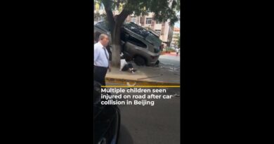 Children seen injured on road after car collision in Beijing | AJ #shorts