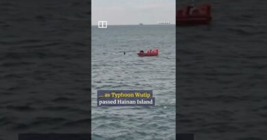 Chinese boy rescued after drifting on paddle board amid typhoon #shorts