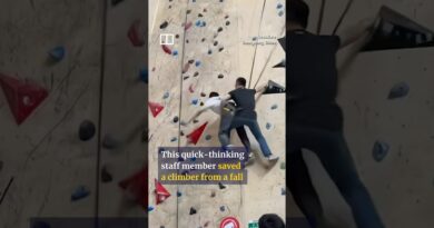 Chinese staff member catches falling climber who forgot safety lock #shorts