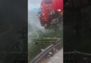 Moment: Truck with driver inside hangs precariously over edge of collapsed bridge in China | DW News