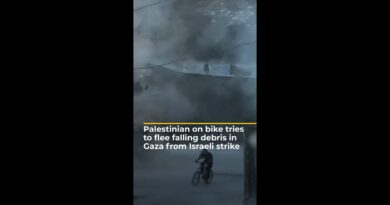 Palestinian on bike tries to flee falling debris in Gaza from Israeli strike | AJ #shorts