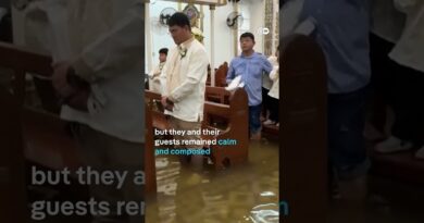 Filipino couple walk down flooded aisle on wedding day  | DW News
