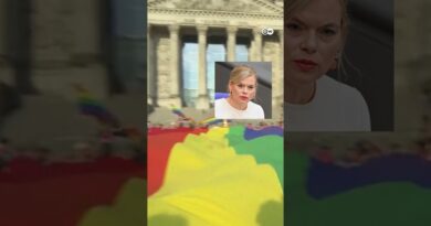 Huge rainbow flag placed at Reichstag by protesters ahead of Berlin Pride | DW News