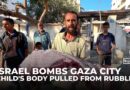Israeli air attack kills sleeping families in Gaza City as rescuers pull child’s body from rubble