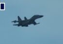Chinese fighter jet flies close to Philippine coastguard plane in South China Sea