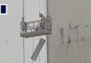 Construction workers trapped mid-air as rainstorm hits China