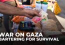 Palestinians in Gaza barter for survival as Israel’s war collapses the banking system