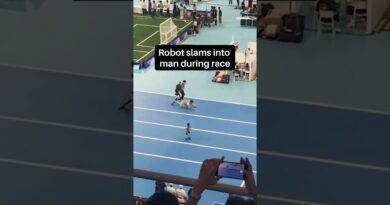 Robot slams into man during race