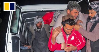 Afghan rescuers dig out body buried after 6.3 earthquake