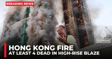 Hong Kong high-rise fire kills at least four as emergency crews battle flames