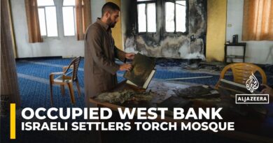 Israeli settlers torch and deface a mosque in a Palestinian village in the occupied West bank