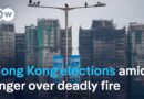 Hong Kong votes in legislative election as city mourns deadly high rise fire | DW News