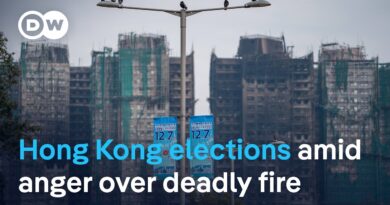 Hong Kong votes in legislative election as city mourns deadly high rise fire | DW News