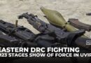M23 rebels display seized arms in the captured DRC city of Uvira