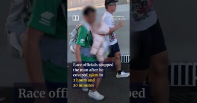 Man disqualified from HK marathon for running with baby