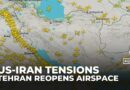 Tension lingers amid threats as Iran reopens airspace