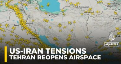 Tension lingers amid threats as Iran reopens airspace