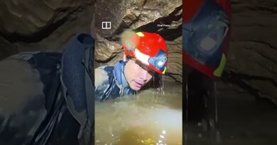 Rescuers race to save miners in flooded Laos cave