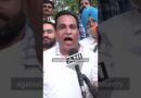 Protesters celebrate after India’s education minister quits