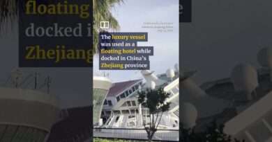 Typhoon Bavi tilts luxury cruise ship on its side