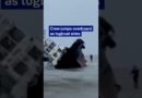 The moment a crew jumps overboard as Philippine tugboat sinks | DW News